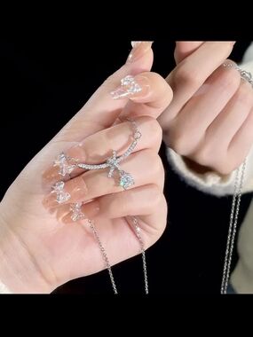 Stainless Steel Starburst Pendant Necklace